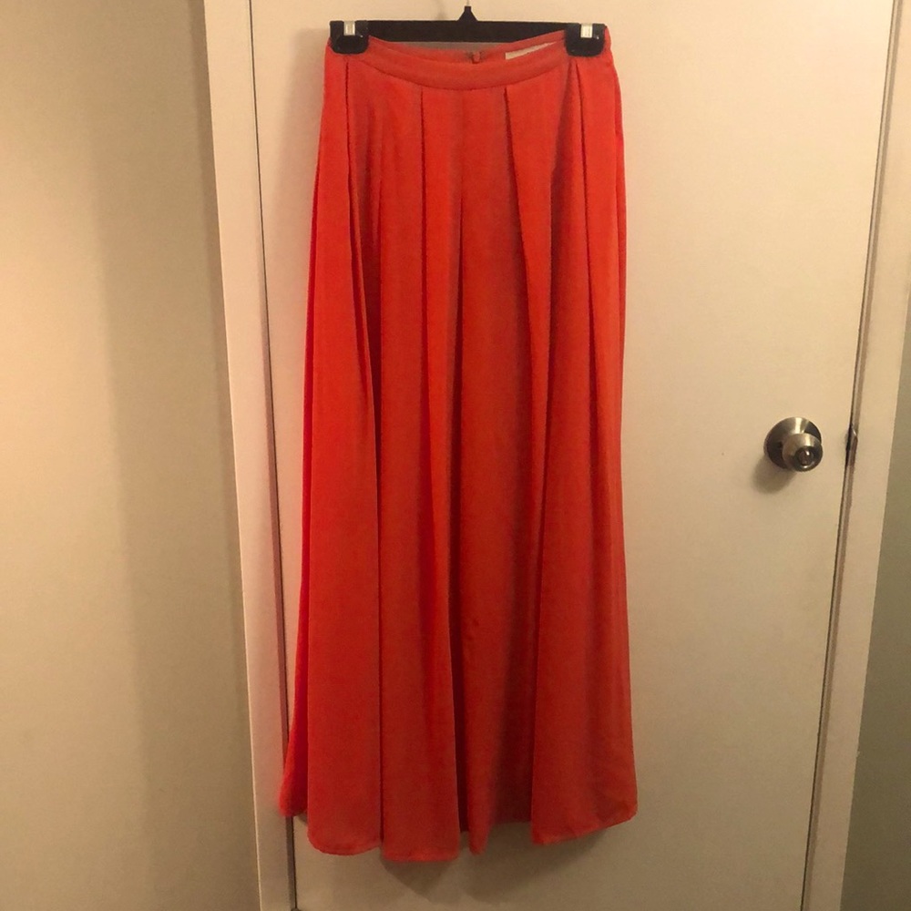 Orangey red floor length skirt, purchased in Italy. Never worn. Size medium